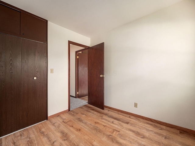 668 Kenilworth Ct, Columbus, OH 43230 - unfurnished bedroom with light wood-type flooring and a closet