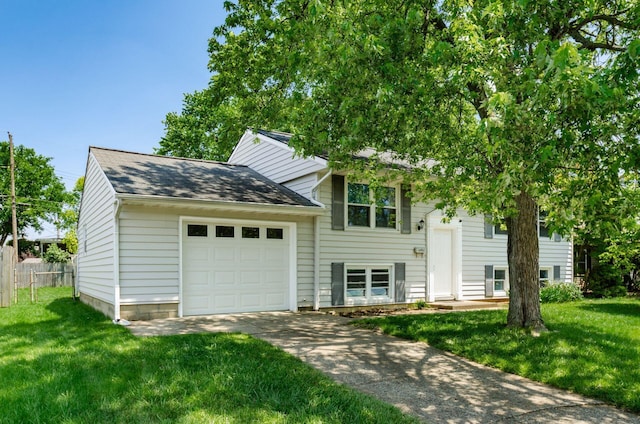 668 Kenilworth Ct, Columbus, OH 43230 - raised ranch with driveway, a garage, and roof with shingles