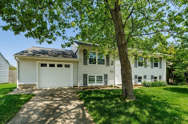 668 Kenilworth Ct, Columbus, OH 43230 - view of front facade featuring driveway, a front lawn, an attached garage, and roof with shingles