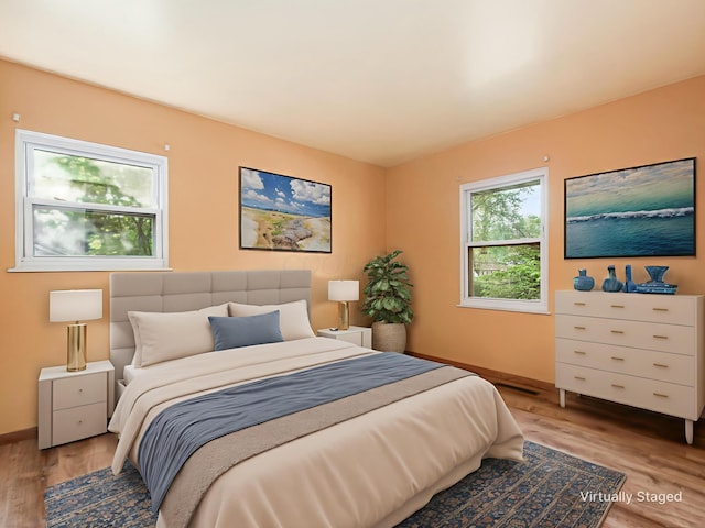668 Kenilworth Ct, Columbus, OH 43230 - bedroom with wood finished floors and baseboards