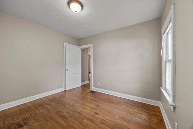 685 S Hague Ave, Columbus, OH 43204 - unfurnished room featuring wood finished floors and plenty of natural light