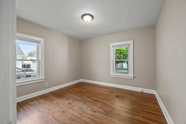 685 S Hague Ave, Columbus, OH 43204 - empty room with wood finished floors and baseboards