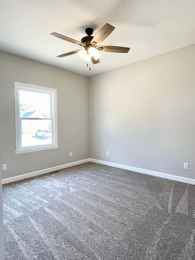 32352 Lilac Ln, Logan, OH 43138 - carpeted spare room featuring a ceiling fan and baseboards