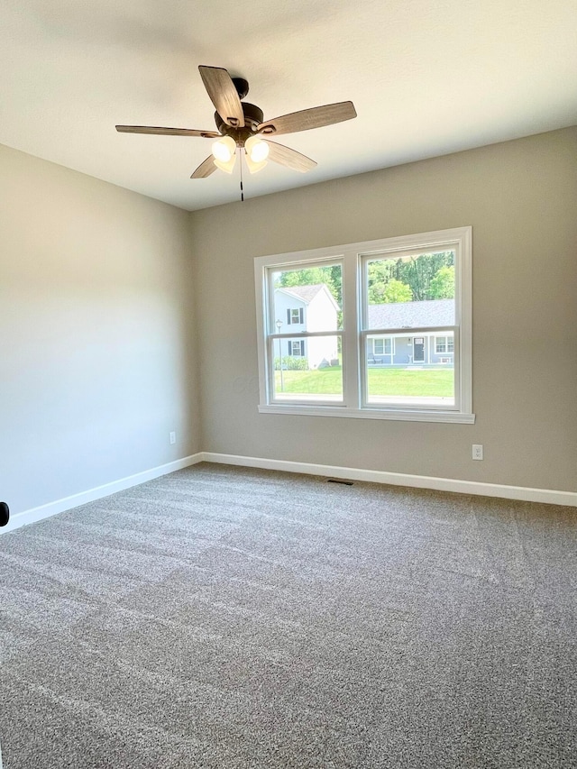 32352 Lilac Ln, Logan, OH 43138 - carpeted empty room featuring a ceiling fan and baseboards