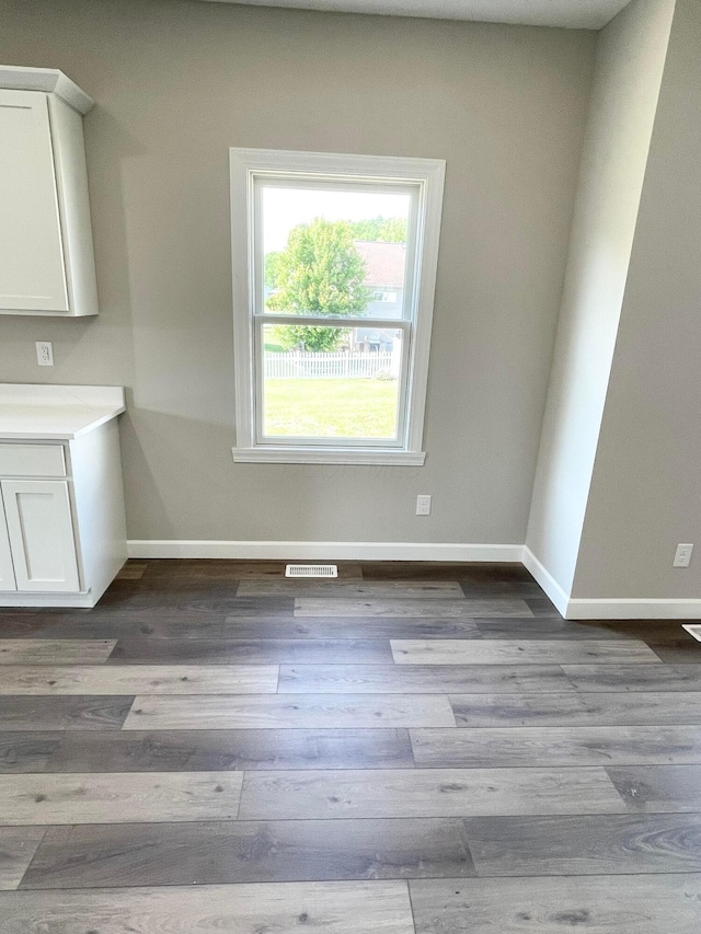 32352 Lilac Ln, Logan, OH 43138 - unfurnished dining area with baseboards and wood finished floors