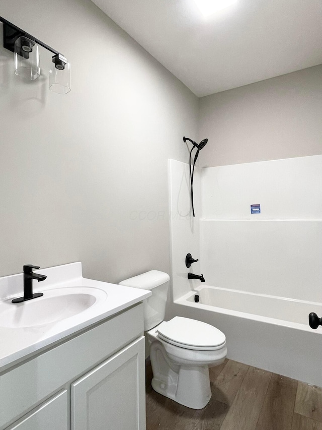 32352 Lilac Ln, Logan, OH 43138 - bathroom with wood finished floors, vanity, and bathing tub / shower combination