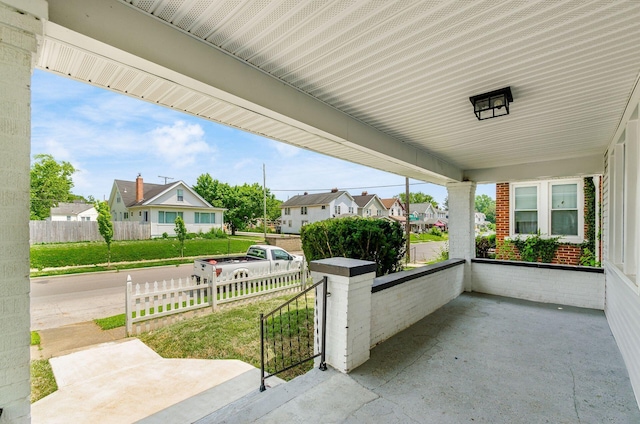 1233 Oakwood Ave, Columbus, OH 43206 - covered porch featuring a residential view