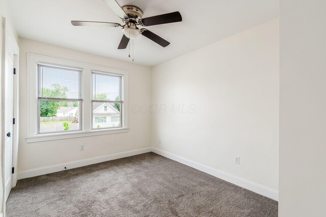 1233 Oakwood Ave, Columbus, OH 43206 - spare room with carpet flooring and a ceiling fan