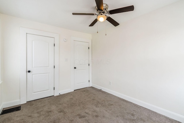 1233 Oakwood Ave, Columbus, OH 43206 - unfurnished bedroom featuring carpet and a ceiling fan