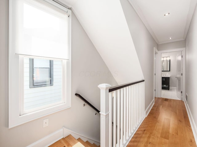 248 E Whittier St, Columbus, OH 43206 - corridor featuring an upstairs landing, light wood finished floors, recessed lighting, and crown molding