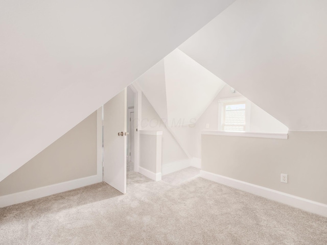 248 E Whittier St, Columbus, OH 43206 - additional living space featuring carpet and vaulted ceiling