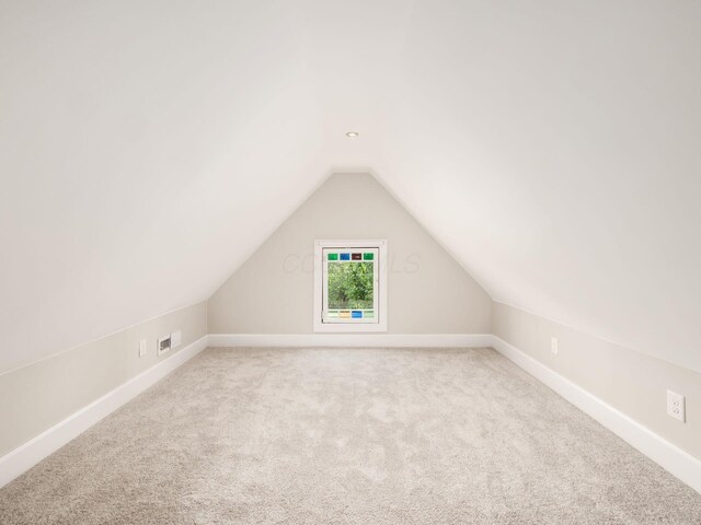 248 E Whittier St, Columbus, OH 43206 - bonus room featuring lofted ceiling and light carpet