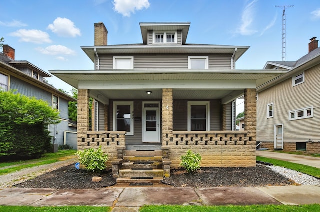 835 Rogers St, Bucyrus, OH 44820 - traditional style home with a porch and a chimney