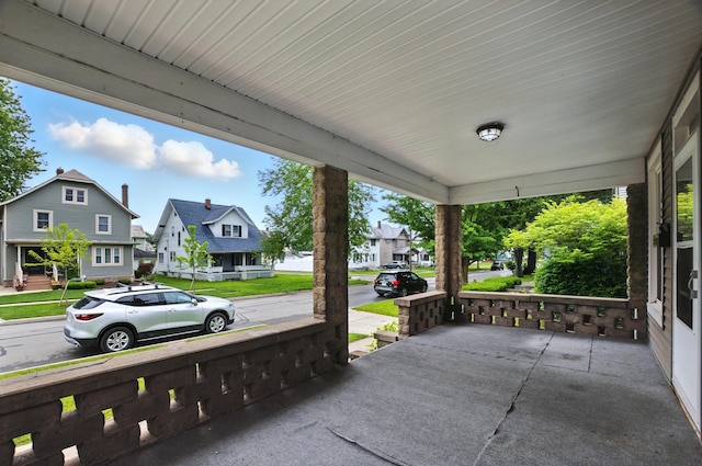 835 Rogers St, Bucyrus, OH 44820 - covered porch featuring a residential view
