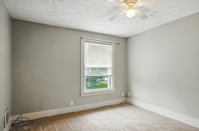 835 Rogers St, Bucyrus, OH 44820 - carpeted spare room featuring ceiling fan and a textured ceiling