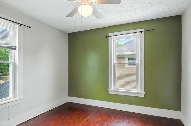 835 Rogers St, Bucyrus, OH 44820 - empty room featuring dark wood finished floors and a ceiling fan