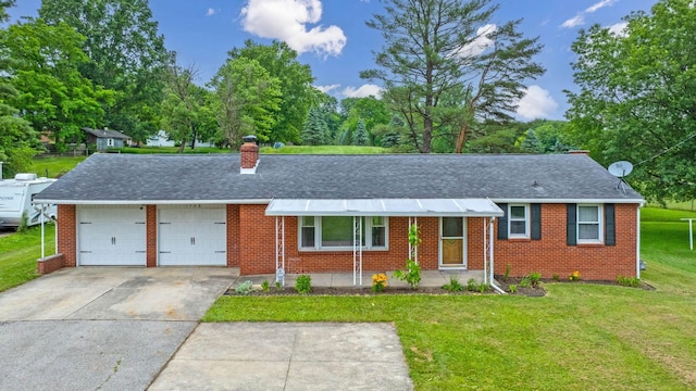 1508 W Hanley Rd, Mansfield, OH 44904 - single story home with a chimney, a front yard, brick siding, and an attached garage