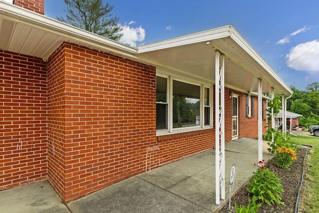 1508 W Hanley Rd, Mansfield, OH 44904 - view of home's exterior with a porch and brick siding