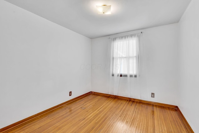 1508 W Hanley Rd, Mansfield, OH 44904 - spare room featuring baseboards and light wood-style floors
