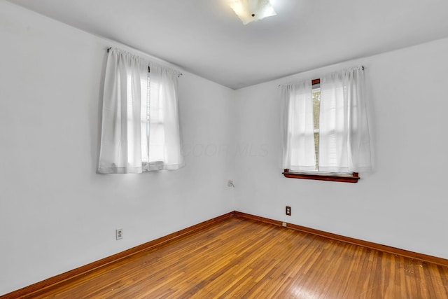1508 W Hanley Rd, Mansfield, OH 44904 - spare room with baseboards and hardwood / wood-style floors