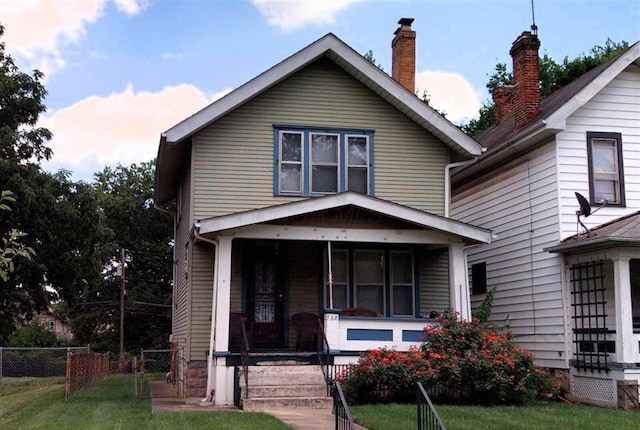 768 Berkeley Rd, Columbus, OH 43205 - view of front of property with covered porch and a chimney