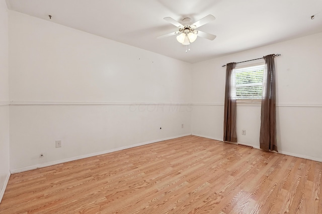 65 Jeffery Ln SE, Heath, OH 43056 - empty room with light wood finished floors and ceiling fan