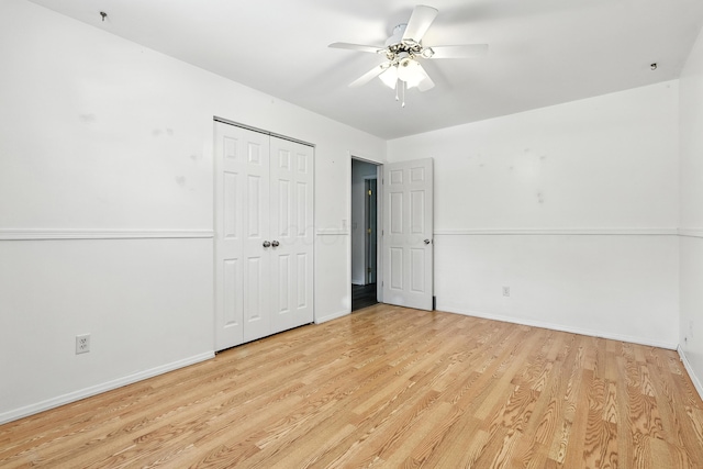 65 Jeffery Ln SE, Heath, OH 43056 - unfurnished bedroom featuring light wood-type flooring, a closet, and ceiling fan