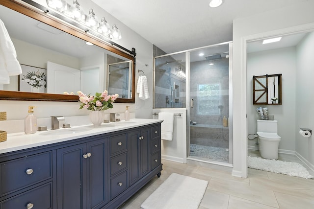 65 Jeffery Ln SE, Heath, OH 43056 - full bath with double vanity, a stall shower, tile patterned floors, and recessed lighting