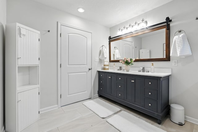 65 Jeffery Ln SE, Heath, OH 43056 - full bathroom with double vanity and tile patterned floors