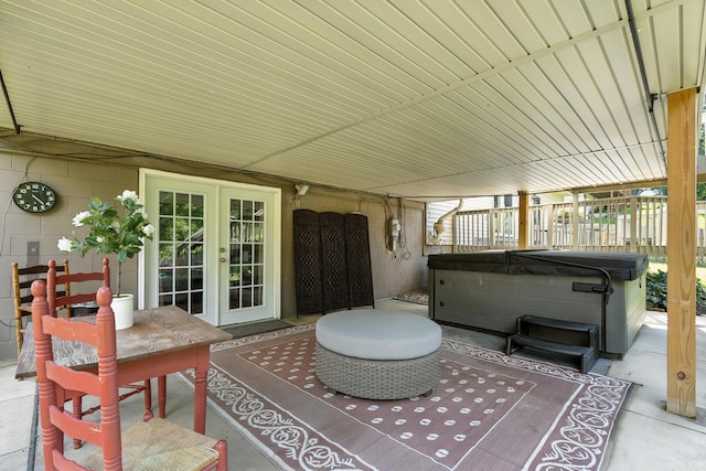65 Jeffery Ln SE, Heath, OH 43056 - view of patio featuring a hot tub and french doors