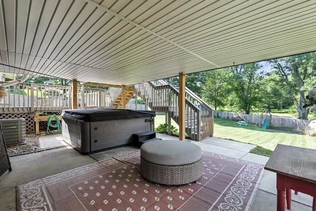 65 Jeffery Ln SE, Heath, OH 43056 - fenced backyard with a hot tub, a patio area, stairs, and a deck