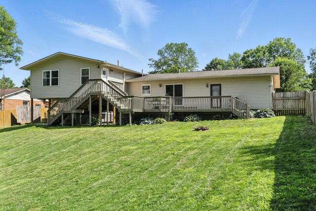 65 Jeffery Ln SE, Heath, OH 43056 - back of house with stairway, a fenced backyard, and a deck