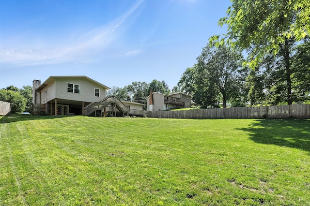 65 Jeffery Ln SE, Heath, OH 43056 - fenced backyard featuring stairway