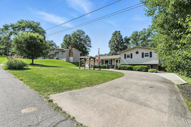 65 Jeffery Ln SE, Heath, OH 43056 - tri-level home featuring a pergola, a front yard, and driveway