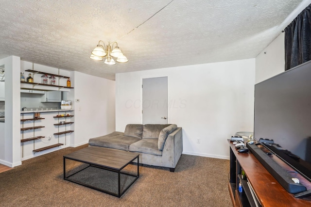 699 Cherry Hollow Rd Unit A, Columbus, OH 43228 - carpeted living room with a chandelier and a textured ceiling
