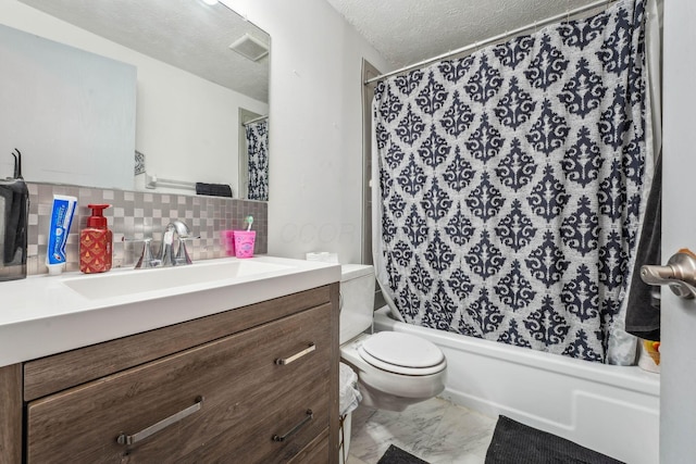 699 Cherry Hollow Rd Unit A, Columbus, OH 43228 - bathroom with vanity, decorative backsplash, shower / bath combo with shower curtain, marble look tile flooring, and a textured ceiling