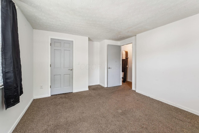699 Cherry Hollow Rd Unit A, Columbus, OH 43228 - unfurnished bedroom with carpet and a textured ceiling