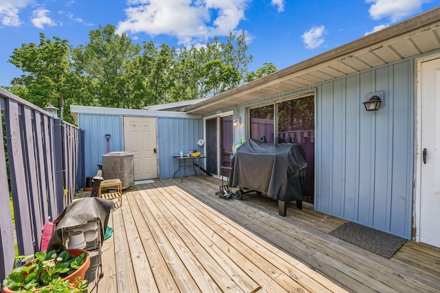 699 Cherry Hollow Rd Unit A, Columbus, OH 43228 - wooden deck with a grill and a storage unit