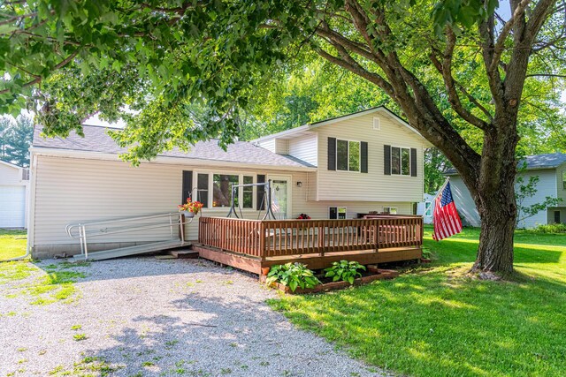 1892 County Road 170, Marengo, OH 43334 - back of house with a yard, a wooden deck, and roof with shingles