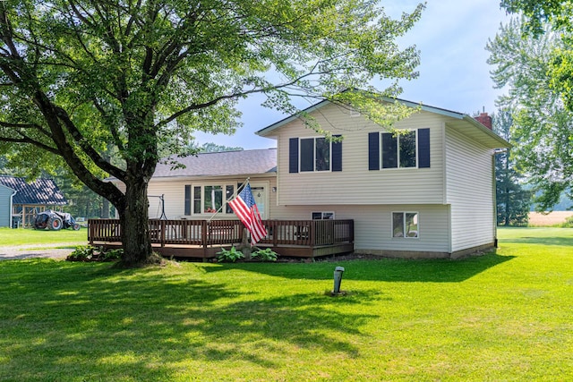 1892 County Road 170, Marengo, OH 43334 - view of front of home featuring a wooden deck, a chimney, and a front yard