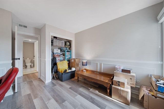 1551 Lafayette Dr Unit B, Columbus, OH 43220 - living area featuring wood finished floors and wainscoting