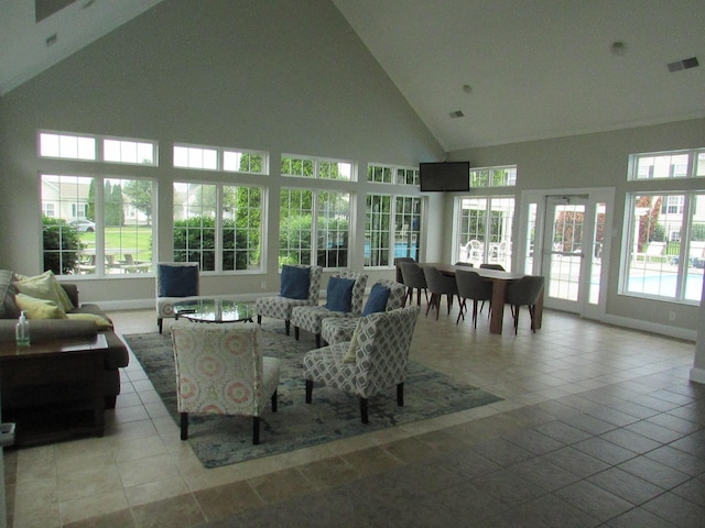 6038 Phar Lap Dr, New Albany, OH 43054 - living area with high vaulted ceiling and baseboards