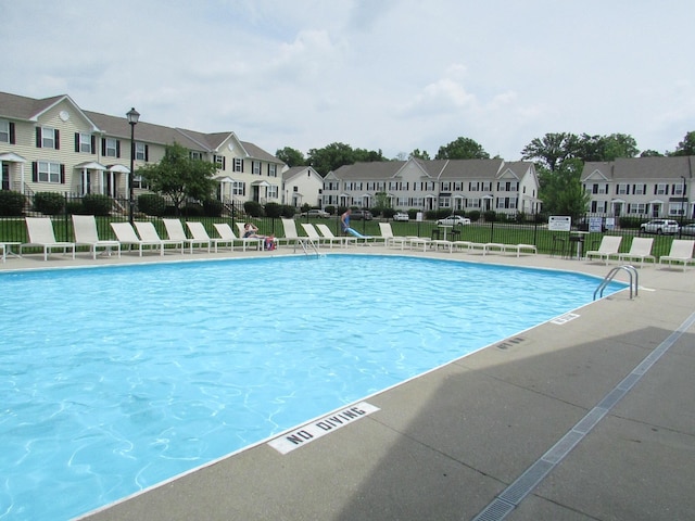 6038 Phar Lap Dr, New Albany, OH 43054 - community pool featuring a residential view