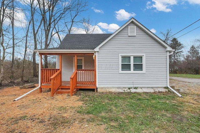 3784 Armuth Ave, Columbus, OH 43219 - rear view of house featuring a porch and a shingled roof