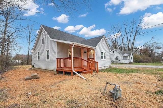 3784 Armuth Ave, Columbus, OH 43219 - view of front of home featuring a shingled roof and a porch