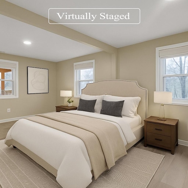 3784 Armuth Ave, Columbus, OH 43219 - bedroom featuring multiple windows, light wood finished floors, and recessed lighting