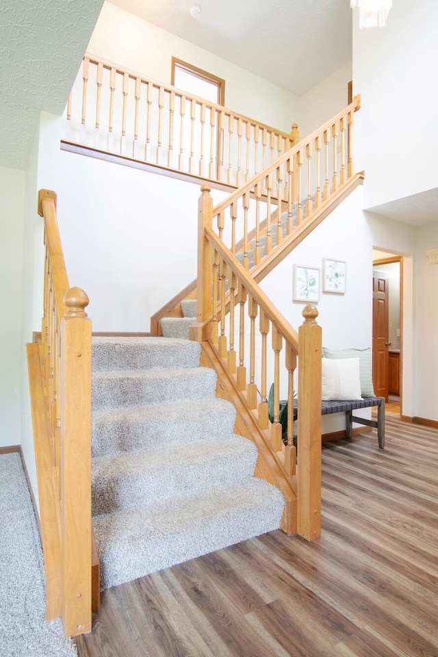 237 Harvard Loop, Delaware, OH 43015 - stairs featuring wood finished floors and baseboards