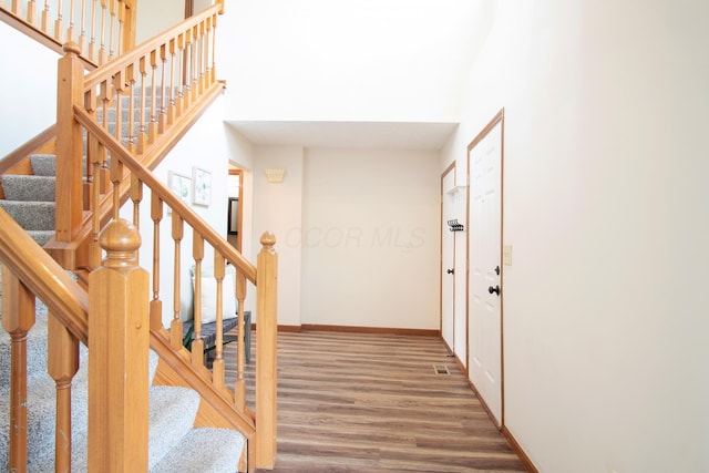 237 Harvard Loop, Delaware, OH 43015 - foyer with wood finished floors, stairs, and a towering ceiling