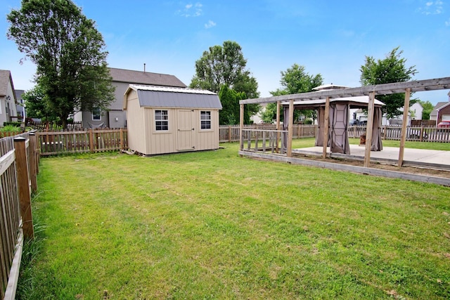 237 Harvard Loop, Delaware, OH 43015 - fenced backyard featuring a storage unit and a pergola