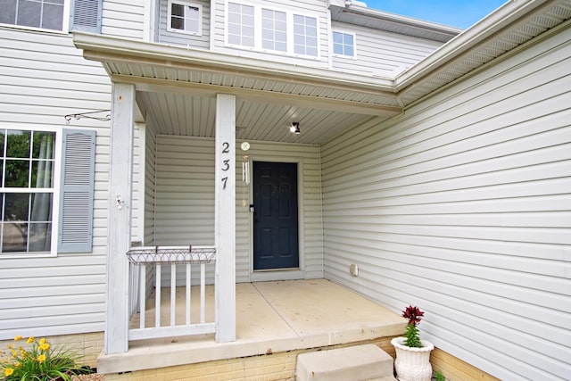237 Harvard Loop, Delaware, OH 43015 - view of exterior entry with a porch